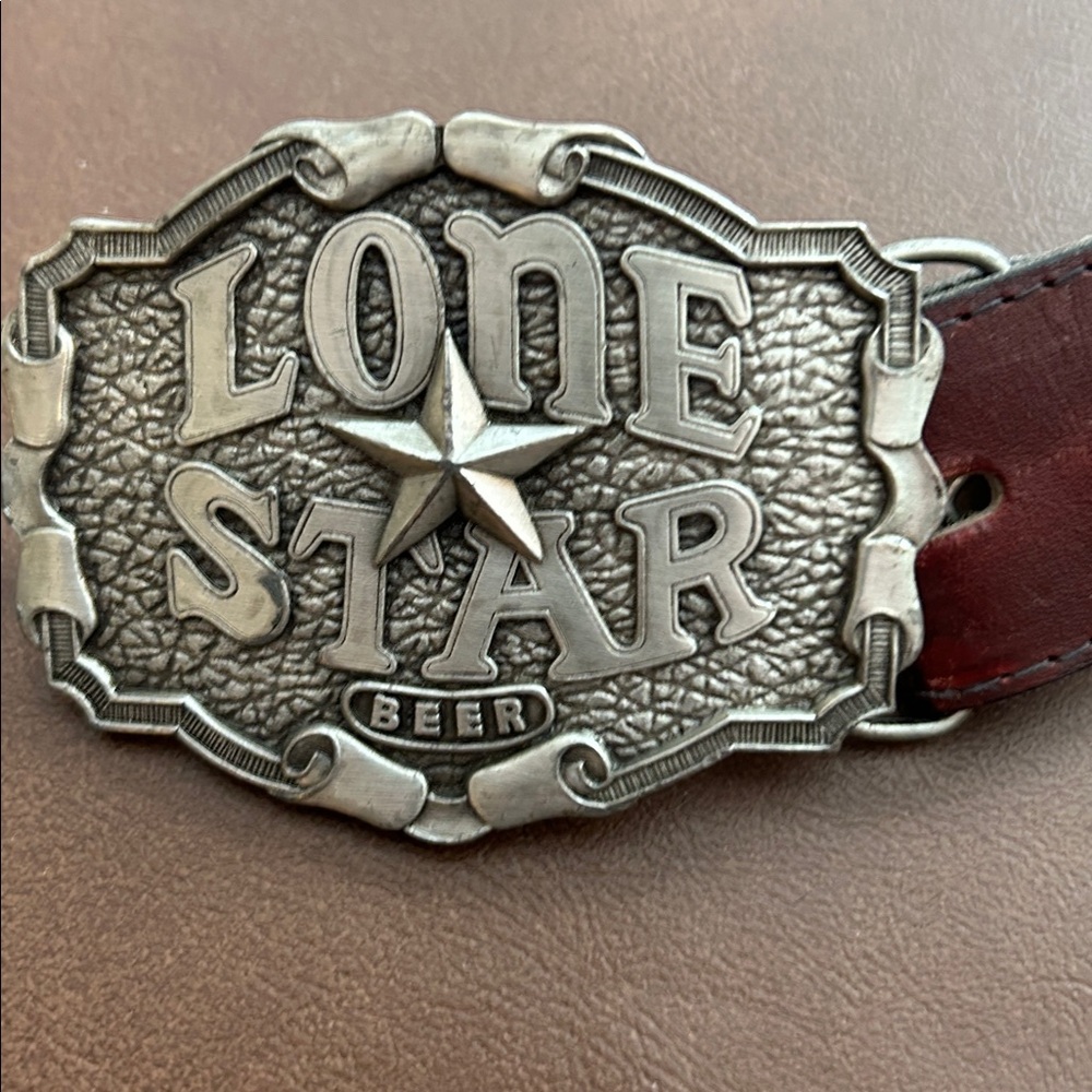 Love Star Belt Buckle also a bottle opener 
Groovy belt from Mexico. 38